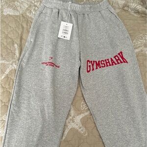 Gymshark: Gray and red graphic sweatpants/joggers